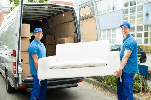Local movers handling boxes and furniture for a Maida Vale home move