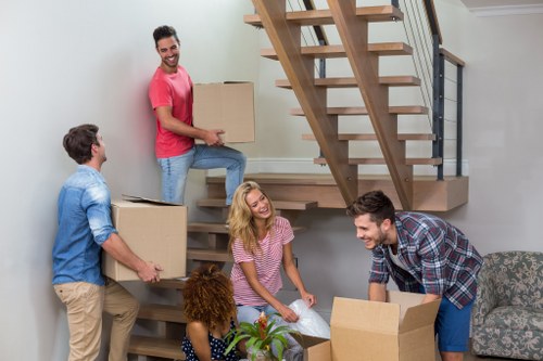 Office removals team planning a move in Maida Vale with boxes and desks