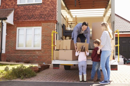 Professional movers handling office furniture in Maida Vale
